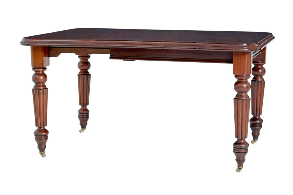 19TH CENTURY HIGH VICTORIAN EXTENDING MAHOGANY DINING TABLE