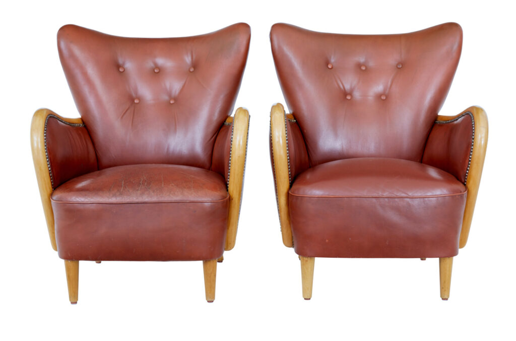 Pair of Mid Century Shaped Leather Armchairs