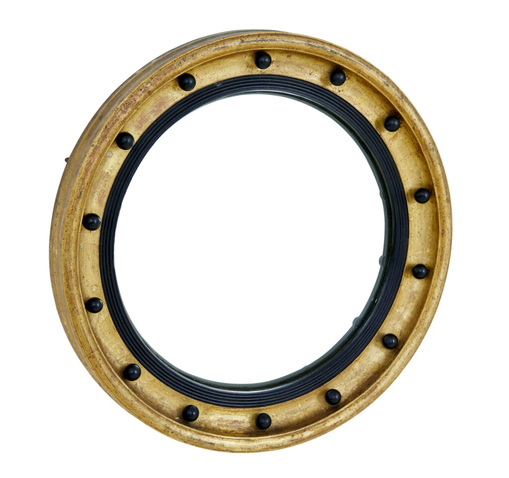 19TH CENTURY EBONISED AND GILT CONVEX MIRROR