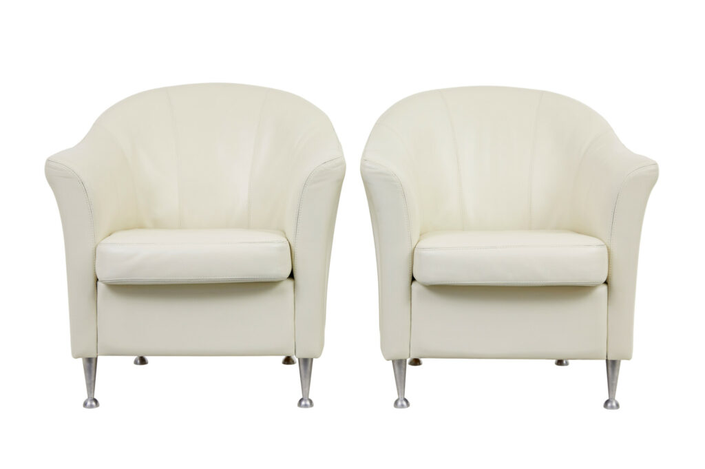 PAIR OF MID-20TH CENTURY SCANDINAVIAN LEATHER TUB ARMCHAIRS