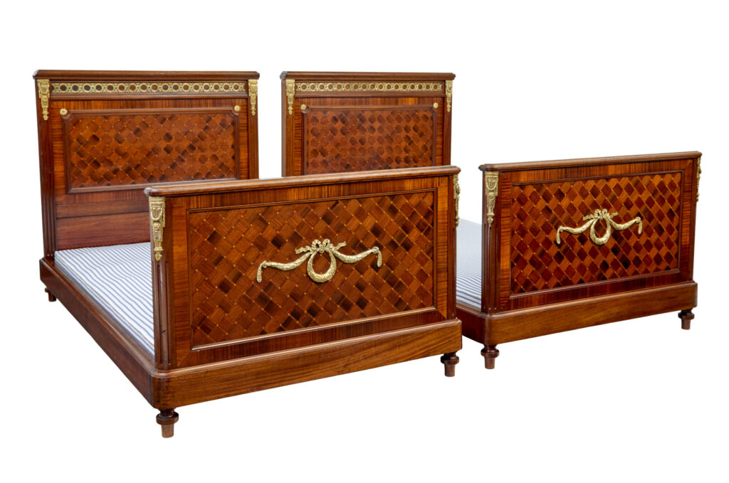 Pair of 19th Century French Empire Mahogany and Walnut Beds