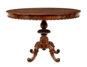 19TH CENTURY CARVED FLAME MAHOGANY OVAL CENTER TABLE