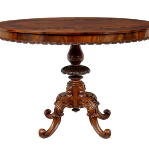 19TH CENTURY CARVED FLAME MAHOGANY OVAL CENTER TABLE