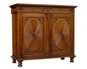 MID 19TH CENTURY ANGLO INDIAN CARVED PADOUK CABINET