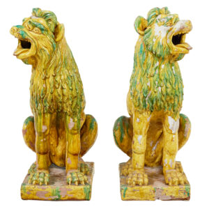 PAIR OF MID 20TH CENTURY SALT GLAZED DECORATIVE DOGS OF FO