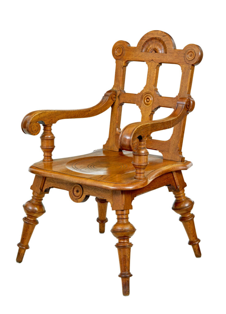 LATE 19TH CENTURY CARVED OAK ARTS AND CRAFTS ARMCHAIR