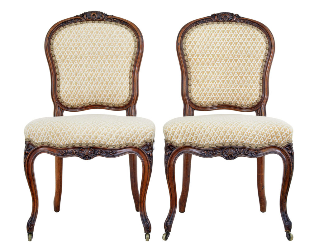PAIR OF 19TH CENTURY CARVED WALNUT SIDE CHAIRS