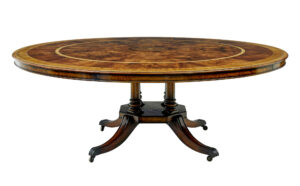 CIRCULAR EXTENDING JUPE DINING TABLE WITH BURR DETAILING