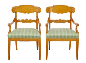 PAIR OF EARLY 20TH SWEDISH CARVED BIRCH ARMCHAIRS