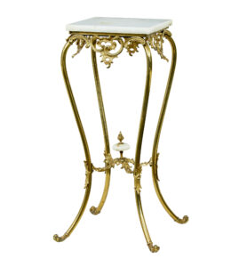 20TH CENTURY CHISELED BRASS AND OYNX PEDESTAL TABLE