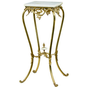 20TH CENTURY CHISELED BRASS AND OYNX PEDESTAL TABLE