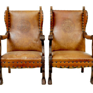 PAIR OF 19TH CENTURY OAK AND EMBOSSED LEATHER ARMCHAIRS